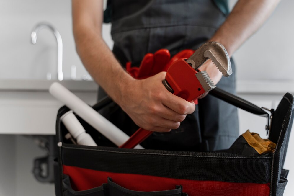 front-view-man-working-as-plumber_23-2150746298